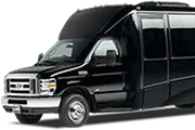 Front view of a black Ford shuttle bus with tinted windows